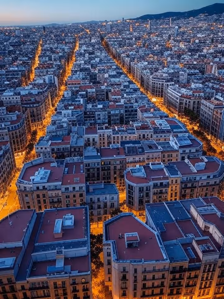 Vista aérea del distrito Eixample de Barcelona con su arquitectura característica al atardecer